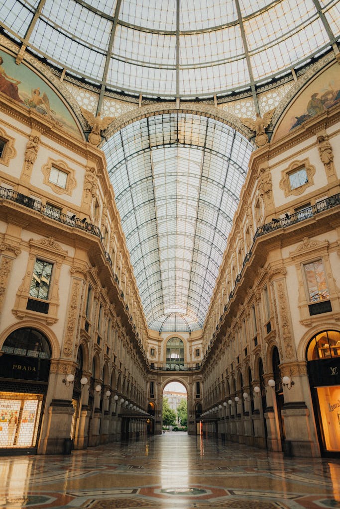 Explore the iconic Galleria Vittorio Emanuele II with its elegant architecture in Milan, Italy.